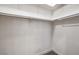 Walk in closet, complete with clothing racks and new carpet at 2107 Fountain Springs Dr, Henderson, NV 89074