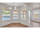 Sun-drenched dining area offers views of the backyard pool and patio at 2107 Fountain Springs Dr, Henderson, NV 89074