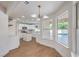 Bright dining room showcases kitchen view and backyard pool at 2107 Fountain Springs Dr, Henderson, NV 89074