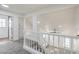Upstairs hallway with view of stairs and bedroom at 2107 Fountain Springs Dr, Henderson, NV 89074