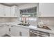 Modern kitchen with quartz countertops, stainless steel appliances, and ample storage space at 2107 Fountain Springs Dr, Henderson, NV 89074