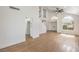 Open-concept living room with high ceilings, stairs and a fan at 2107 Fountain Springs Dr, Henderson, NV 89074