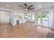 Spacious living room boasts a wet bar, kitchen access, and seamless outdoor flow at 2107 Fountain Springs Dr, Henderson, NV 89074