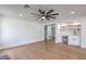 Entertain in this spacious living room with wet bar and custom shelving at 2107 Fountain Springs Dr, Henderson, NV 89074