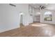 Open concept living room with modern finishes, wood flooring, and abundant natural light at 2107 Fountain Springs Dr, Henderson, NV 89074