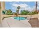 Backyard pool with mature landscaping and gravel at 2107 Fountain Springs Dr, Henderson, NV 89074