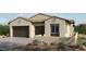 Beautiful single-story home with desert landscaping, multi-car garage, and terracotta roof at 226 Piazzetta Dr, Henderson, NV 89011