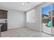 Bright breakfast nook with tiled floors and sliding glass doors to the backyard at 2276 Sky Island Dr, Henderson, NV 89002