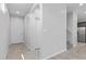 Bright entryway featuring neutral walls, tile flooring, and staircase access at 2276 Sky Island Dr, Henderson, NV 89002