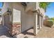Inviting front porch featuring decorative stone accents and classic columns at 2276 Sky Island Dr, Henderson, NV 89002