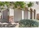 Inviting front porch featuring decorative stone accents and stylish lighting fixtures at 2276 Sky Island Dr, Henderson, NV 89002