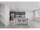 Modern kitchen with stainless steel appliances, granite countertops and barstool seating at 2276 Sky Island Dr, Henderson, NV 89002
