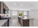 Well-equipped kitchen with granite countertops, stainless steel appliances, and an island at 2276 Sky Island Dr, Henderson, NV 89002