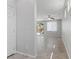 Bright living space featuring neutral walls, tile flooring, and views of the backyard at 2276 Sky Island Dr, Henderson, NV 89002