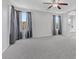 Bright main bedroom with ensuite and neutral walls is perfect for relaxing at 2276 Sky Island Dr, Henderson, NV 89002