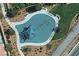 Aerial view of community pool with shade structures, seating, and landscaping at 2276 Sky Island Dr, Henderson, NV 89002