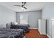 Cozy bedroom featuring twin beds, ceiling fan, and natural light at 231 W Horizon Ridge Pkwy # 1228, Henderson, NV 89012