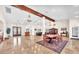 Spacious clubhouse featuring dining area, lounge, hardwood floors, and elegant chandeliers at 231 W Horizon Ridge Pkwy # 1228, Henderson, NV 89012