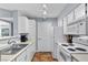 Efficient kitchen features white appliances and countertops at 231 W Horizon Ridge Pkwy # 1228, Henderson, NV 89012