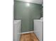 Laundry room area with white washer and dryer, and tiled floors at 231 W Horizon Ridge Pkwy # 1228, Henderson, NV 89012