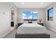 Bedroom featuring a large window and neutral decor at 2601 Nevada Agave Ln, Las Vegas, NV 89138