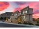 Contemporary two-story home featuring desert landscaping, stucco, and stone exterior at 2601 Nevada Agave Ln, Las Vegas, NV 89138