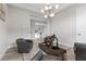 Stylish living room with modern decor, with an open view to the formal dining room at 2601 Nevada Agave Ln, Las Vegas, NV 89138
