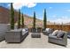 Cozy outdoor seating area with plush furnishings, designed for entertaining and enjoying the natural surroundings at 2601 Nevada Agave Ln, Las Vegas, NV 89138