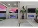 The home features a cozy fireplace on the patio and a modern fireplace in the living room at 2601 Nevada Agave Ln, Las Vegas, NV 89138