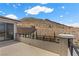 Covered patio boasting mountain views and sleek black railings at 2601 Nevada Agave Ln, Las Vegas, NV 89138