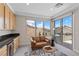 Comfortable sitting area includes a wet bar and sliding glass door leading to an outdoor balcony at 2601 Nevada Agave Ln, Las Vegas, NV 89138