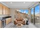 Relaxing wet bar area featuring natural light and gorgeous mountain views at 2601 Nevada Agave Ln, Las Vegas, NV 89138