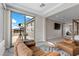 Bright sitting area featuring access to the patio with panoramic mountain views at 2601 Nevada Agave Ln, Las Vegas, NV 89138