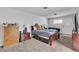 Cozy bedroom with carpet, neutral walls, and basic furnishings at 2749 Heritage Cir, Las Vegas, NV 89121