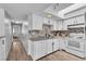 Modern kitchen featuring white cabinetry, stainless steel appliances, and stylish backsplash at 2749 Heritage Cir, Las Vegas, NV 89121
