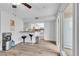 Bright kitchenette with a breakfast bar, modern stools, and white cabinetry at 2749 Heritage Cir, Las Vegas, NV 89121