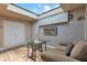 Comfortable sitting area with skylight, modern furnishings, and ample storage space at 2749 Heritage Cir, Las Vegas, NV 89121