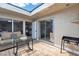 Private patio area with sliding glass doors and a barbecue, perfect for outdoor entertaining at 2749 Heritage Cir, Las Vegas, NV 89121