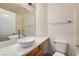 Bright bathroom featuring vessel sink, large mirror, and modern fixtures at 2761 Red Vista Ct, Henderson, NV 89074