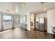 Entryway with herringbone flooring and stainless steel refrigerator at 2761 Red Vista Ct, Henderson, NV 89074