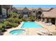 Resort-style pool and jacuzzi with sun loungers, perfect for relaxation at 2761 Red Vista Ct, Henderson, NV 89074
