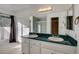 This primary bathroom boasts double sinks, ample vanity space, and a separate tub shower at 335 Greenbriar Townhouse Way, Las Vegas, NV 89121