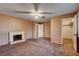 Cozy bedroom with fireplace and convenient access to closet at 335 Greenbriar Townhouse Way, Las Vegas, NV 89121