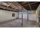 Covered patio featuring an open-beam ceiling, concrete flooring, and access doors and windows at 335 Greenbriar Townhouse Way, Las Vegas, NV 89121