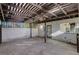 Covered patio featuring an open-beam ceiling, concrete flooring, and access doors and windows at 335 Greenbriar Townhouse Way, Las Vegas, NV 89121