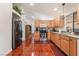 Well-appointed kitchen with stainless steel appliances, ample wood cabinetry, and granite countertops at 3617 Walnut Wood St, Las Vegas, NV 89129