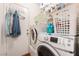 Functional laundry room featuring stacked washer/dryer, and storage space at 3617 Walnut Wood St, Las Vegas, NV 89129