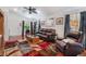 Inviting living room featuring natural light and comfortable leather seating at 3617 Walnut Wood St, Las Vegas, NV 89129