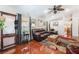 Comfortable living room with wood floors, ceiling fan, and natural lighting at 3617 Walnut Wood St, Las Vegas, NV 89129