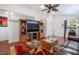 Cozy living room featuring a built-in entertainment center and comfortable seating at 3617 Walnut Wood St, Las Vegas, NV 89129